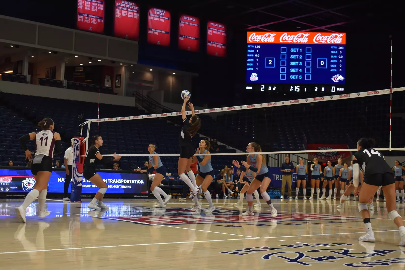 Ella McFarland sets a ball.