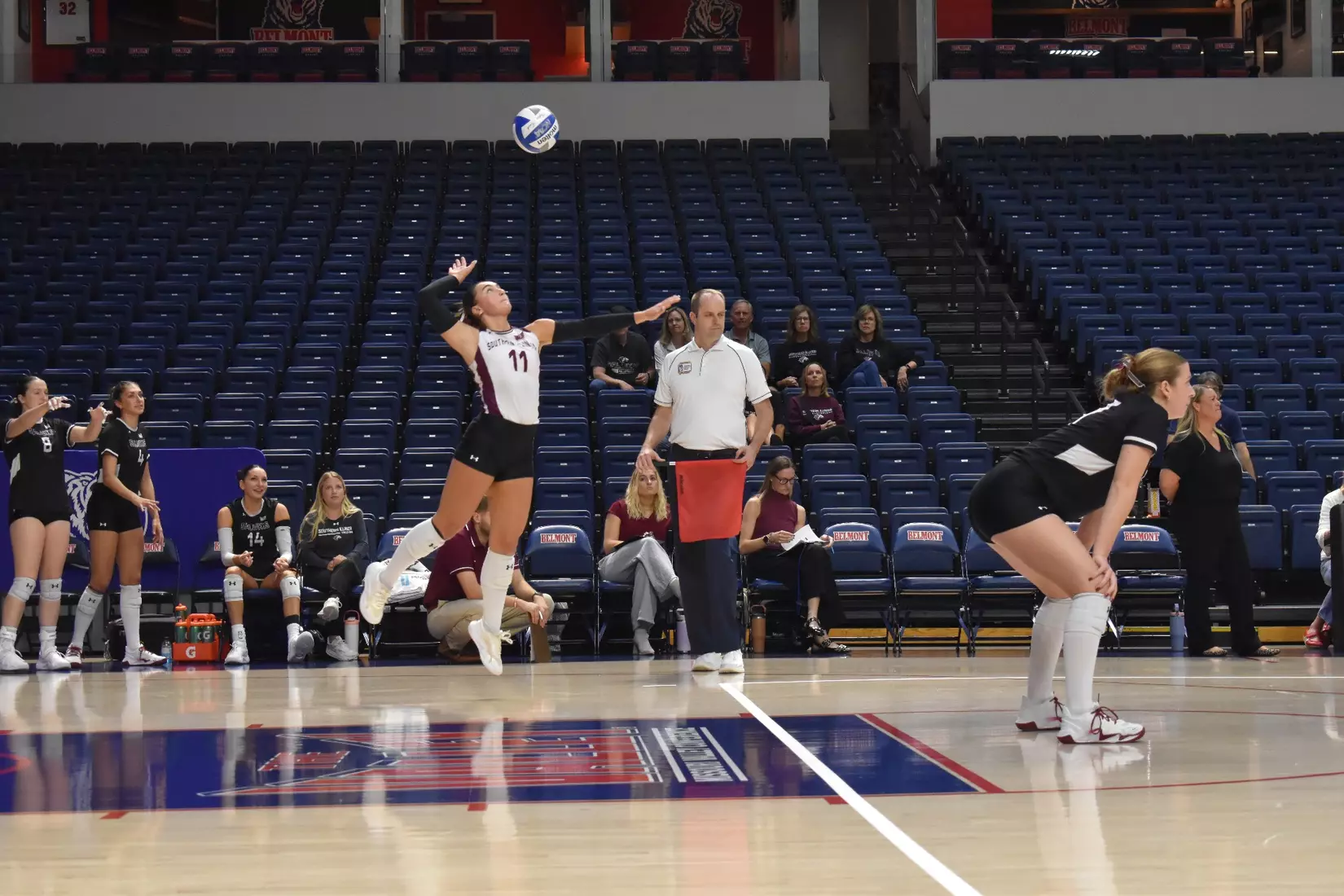 Jillian Shaneyfelt serves a ball.