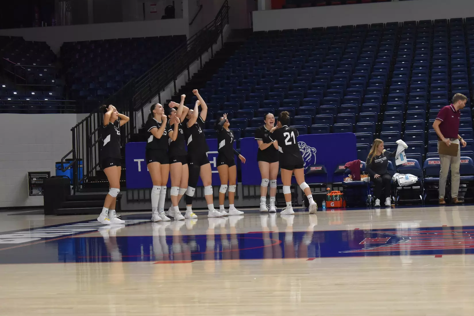 The bench celebrates after a point.