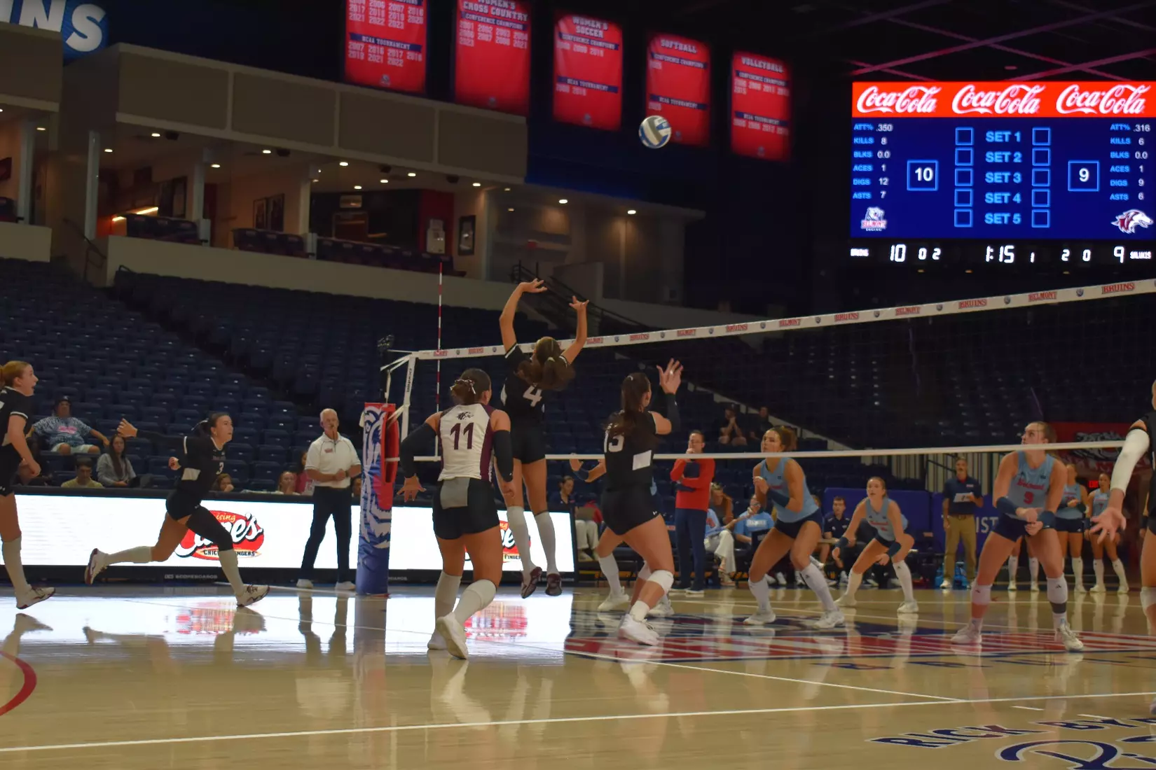 Ella McFarland sets a ball.
