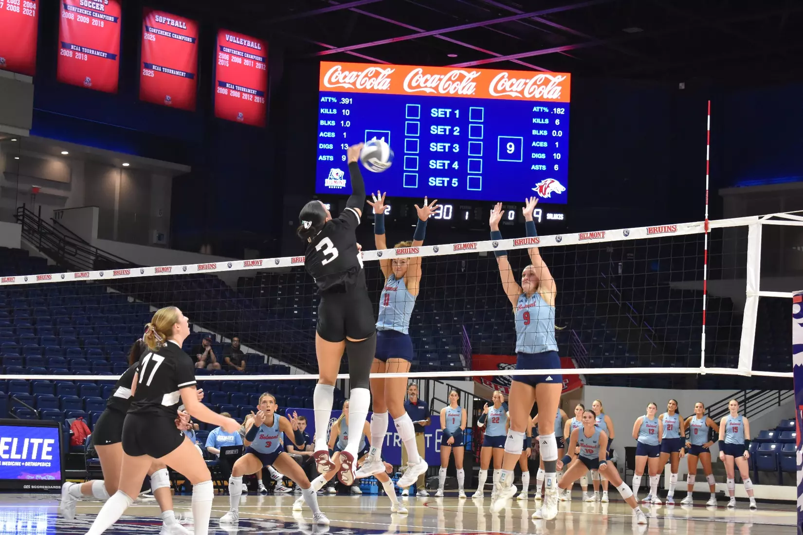McKenzie Moeller attacks a ball.