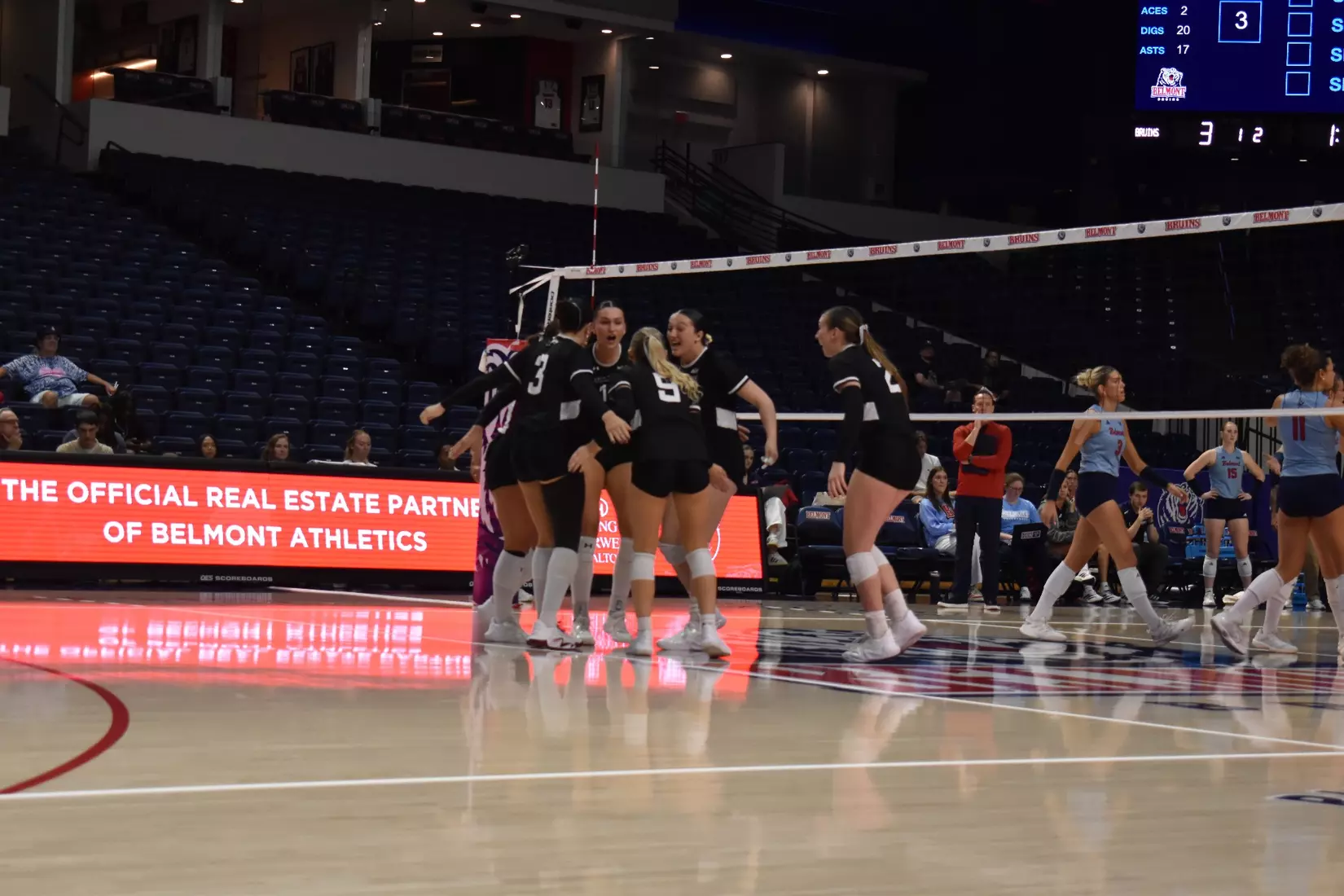 The team celebrates after a point.