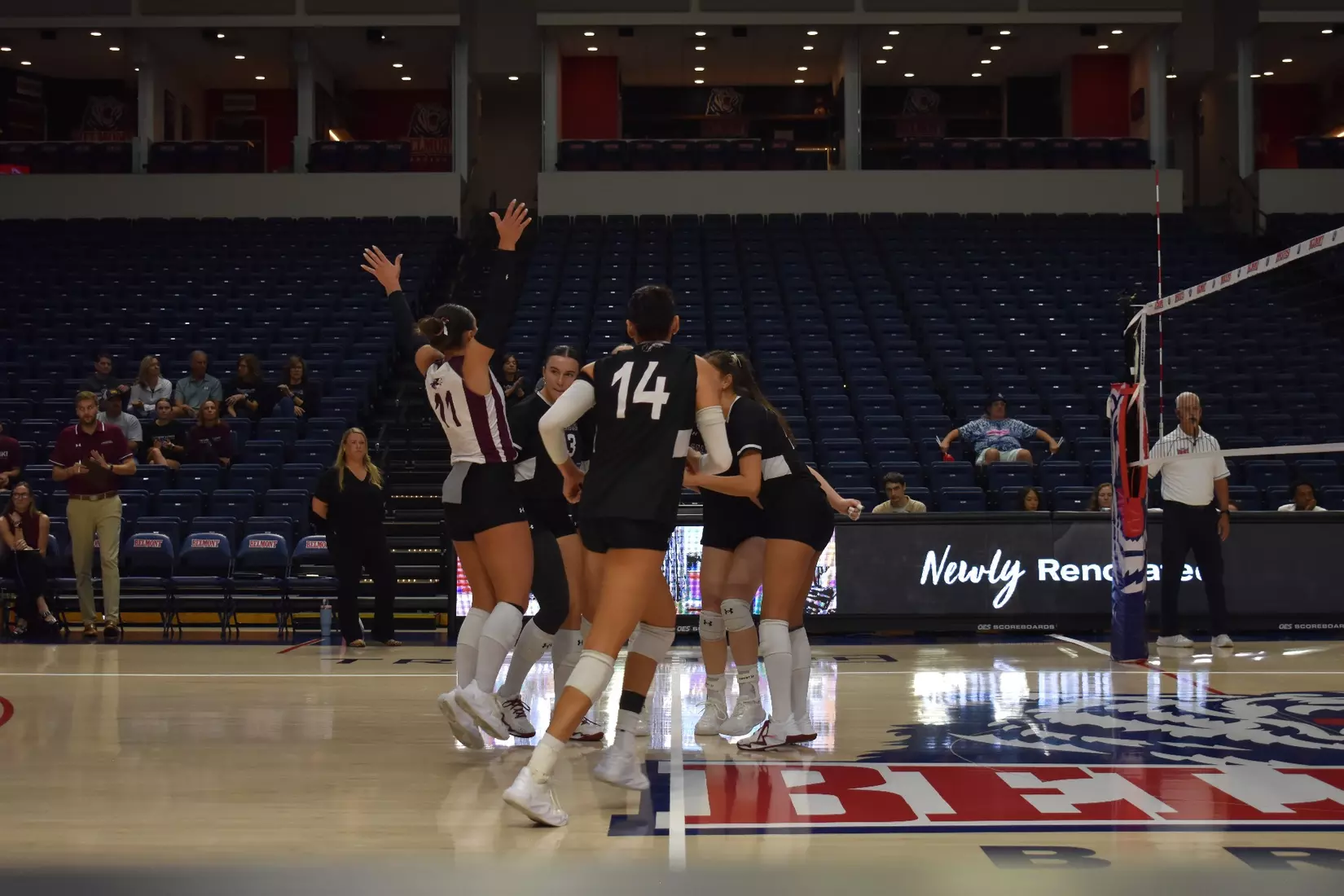 The team celebrates after a point.