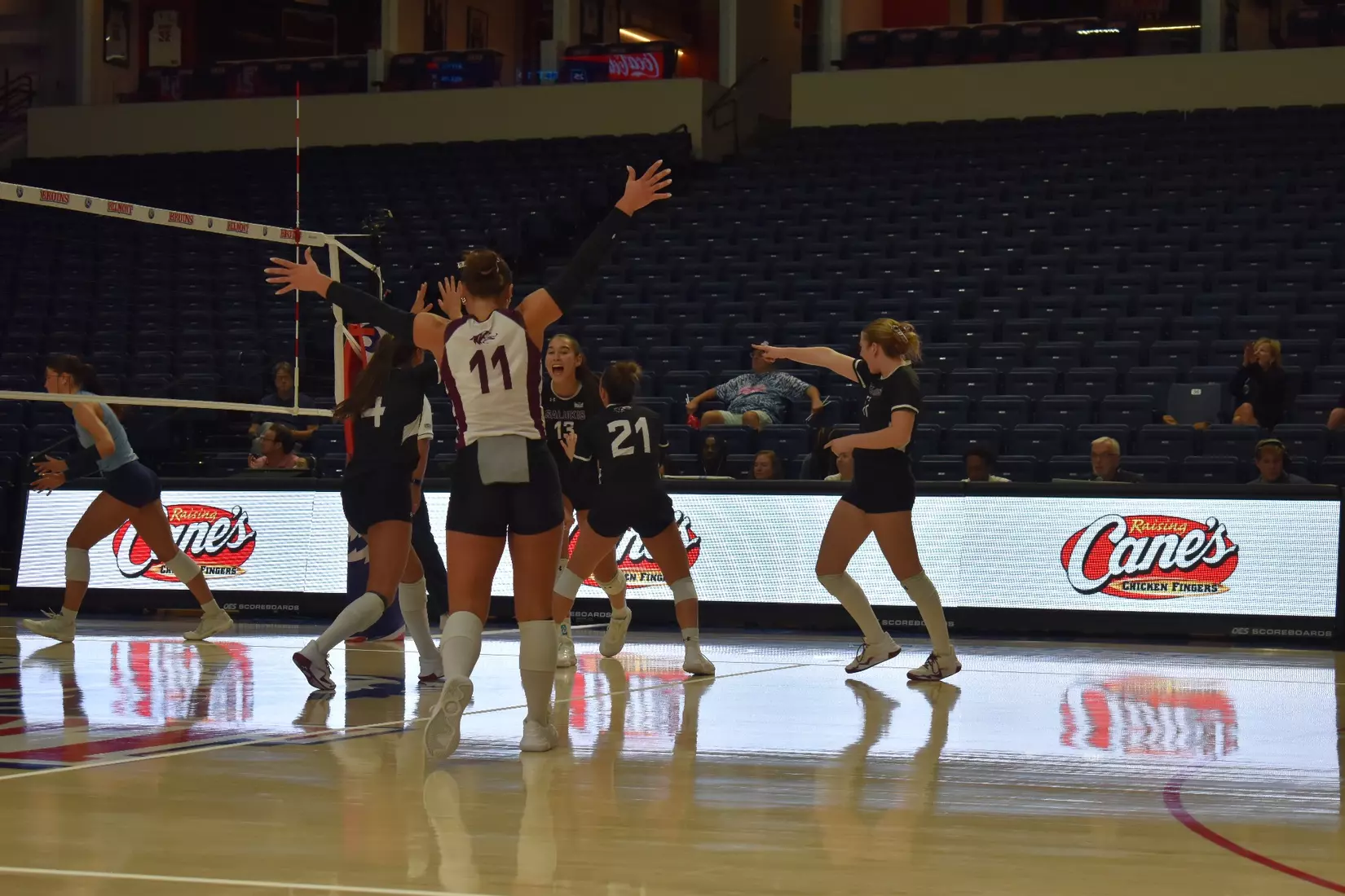 The team celebrates a point.