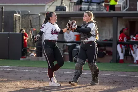 Kaylen Grammer and Avery Hixson during SIU's 15-0 (5) win against Bradley in Game 2 of a doubleheader on Friday, March 13, 2026.