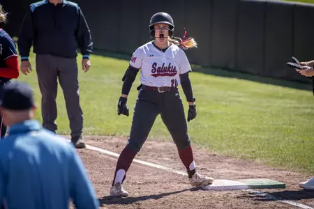Maleah Blomenkamp celebrates at first during game one of a three-game series between SIU and Belmont on March 28, 2026, at Charlotte West Stadium.