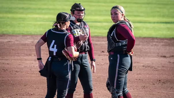 Salukis Huddle in the Circle