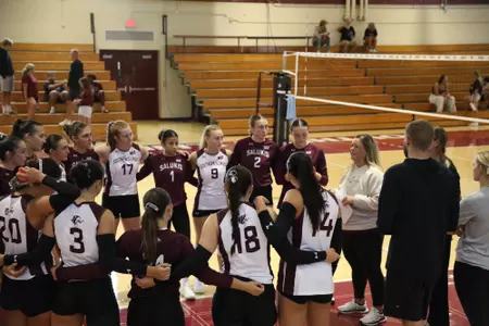Head Coach Brittany Harry talks to the team after the scrimmage.