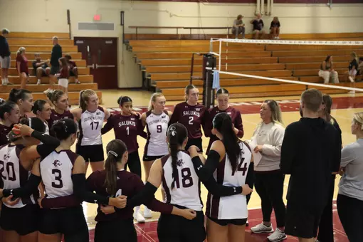 Head Coach Brittany Harry talks to the team after the scrimmage.