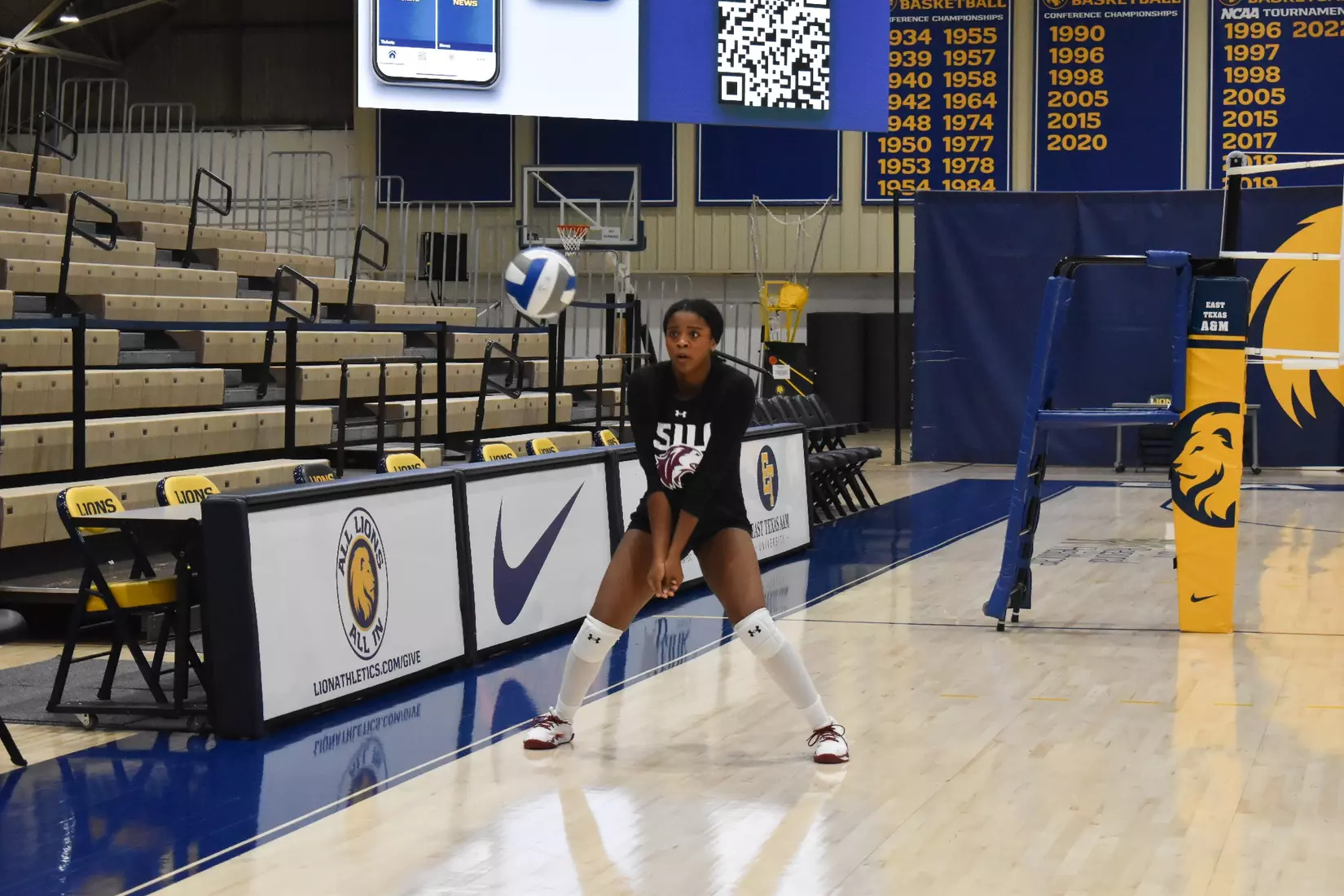 Chloe Anderson bumps a ball in warmups.