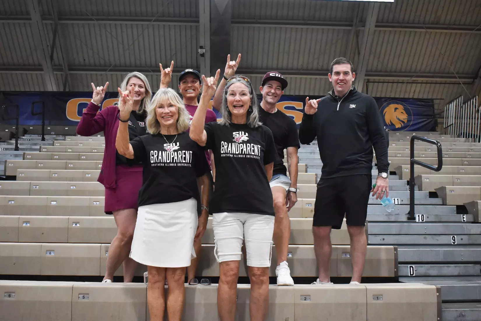 Saluki fans smile for a picture prior to the game.