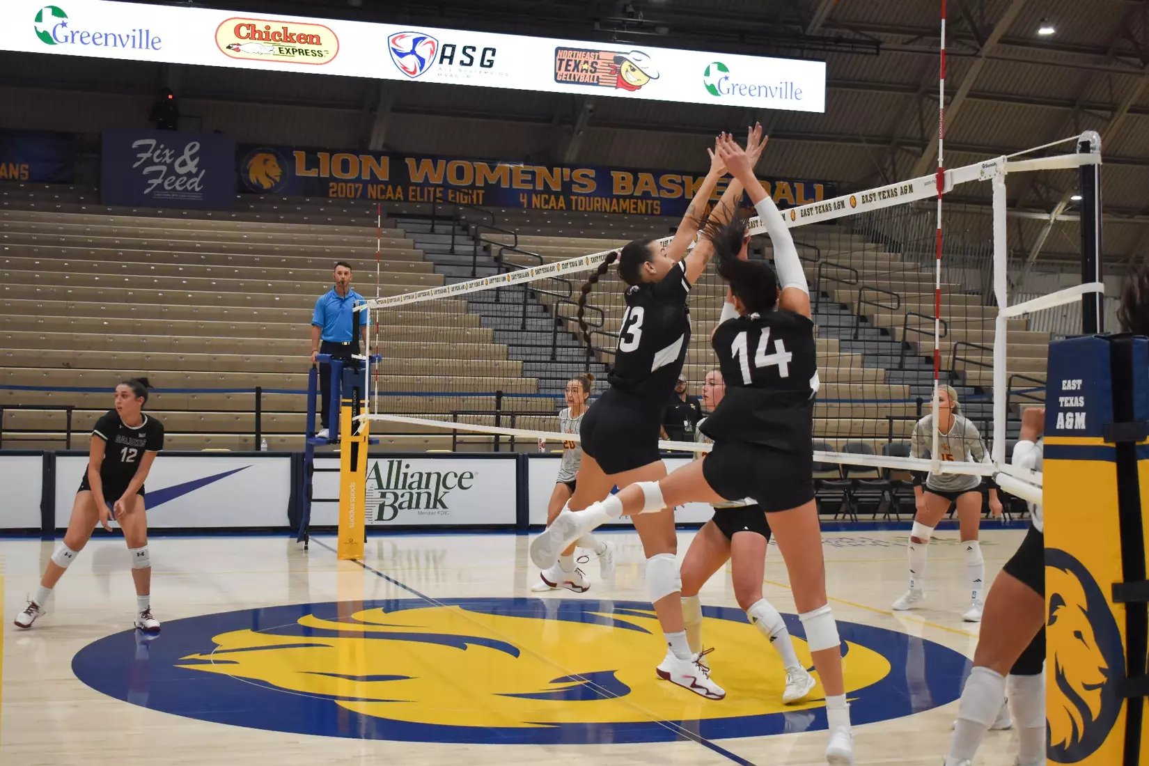 Ella Swansiger and Beatriz Piaia come crashing down after a block attempt.
