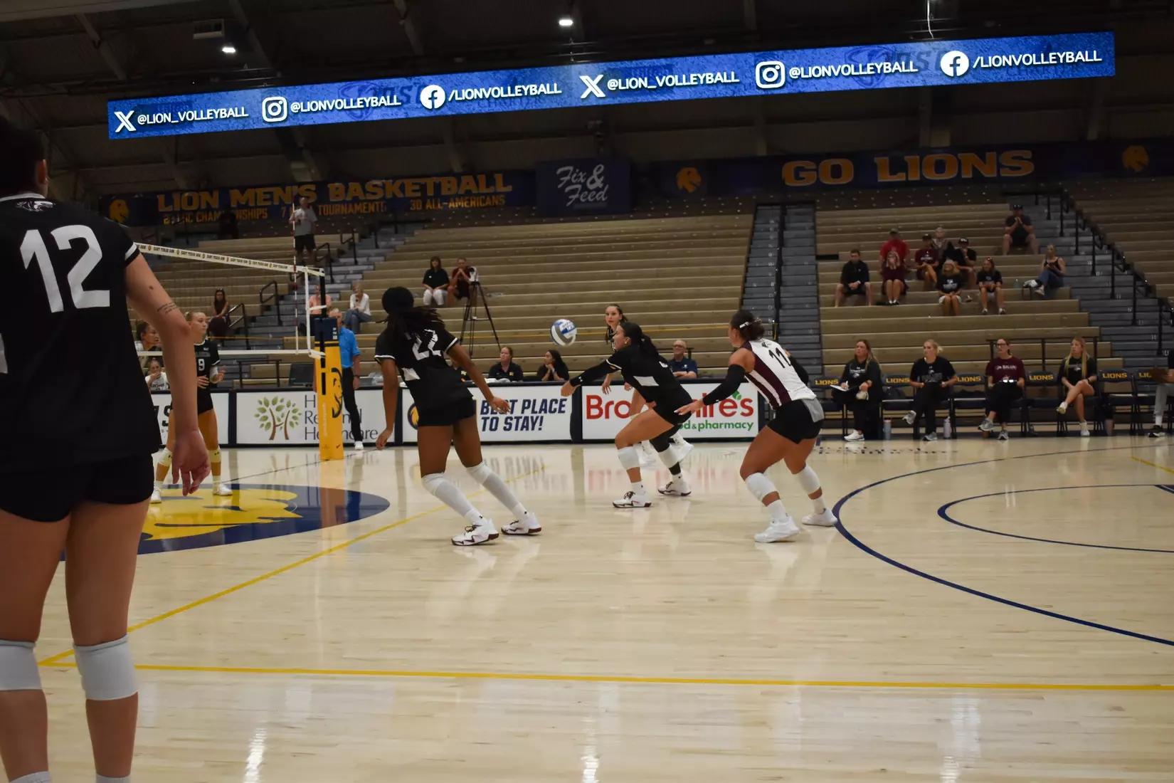 McKenzie Moeller bumps a spiked ball.
