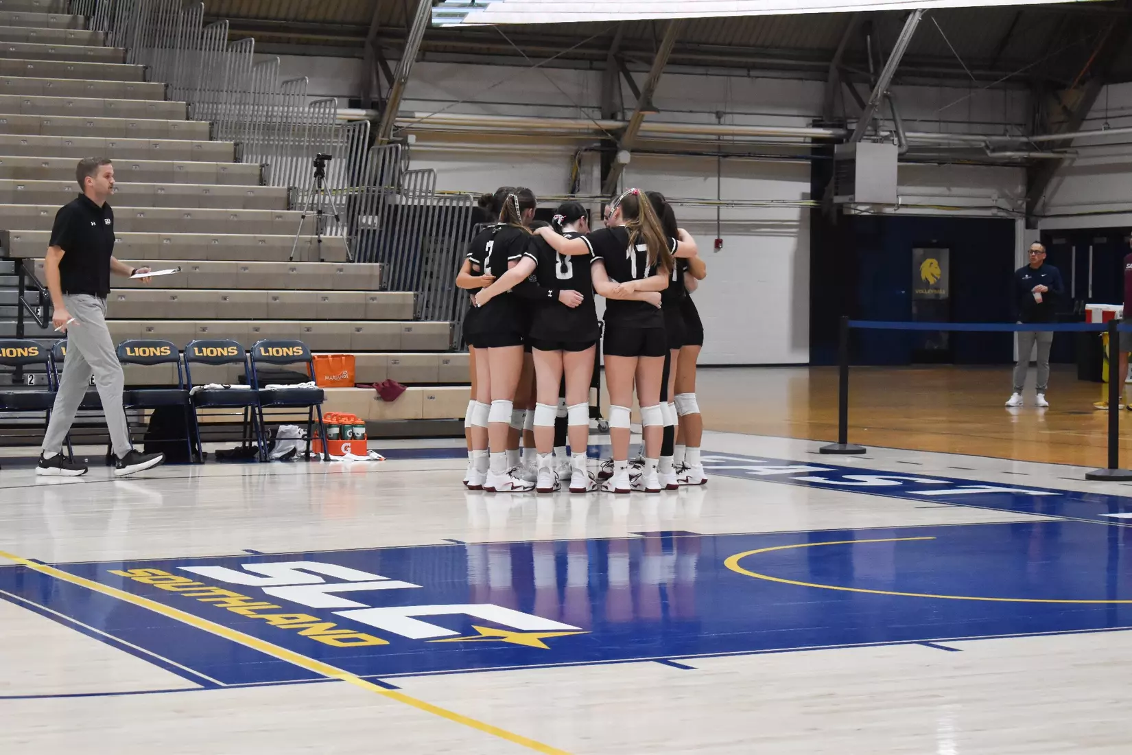 The bench huddles up after a point.