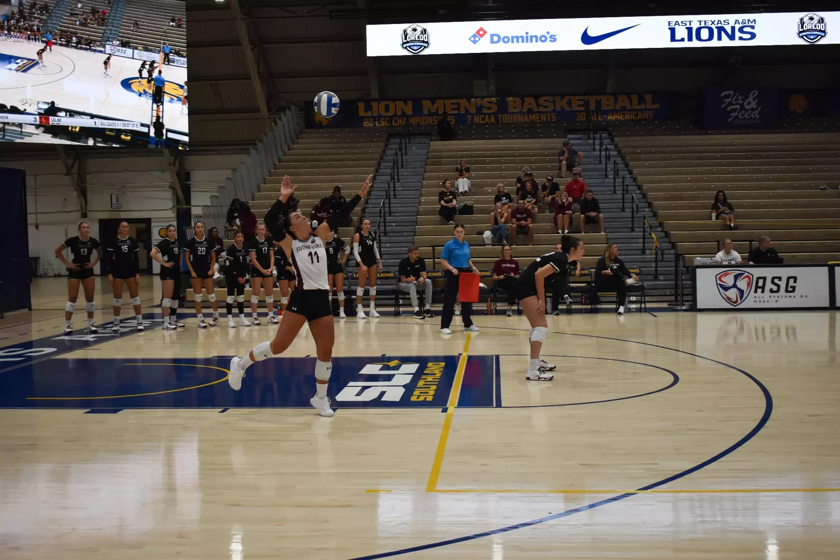 Jillian Shaneyfelt rocks back for a serve.