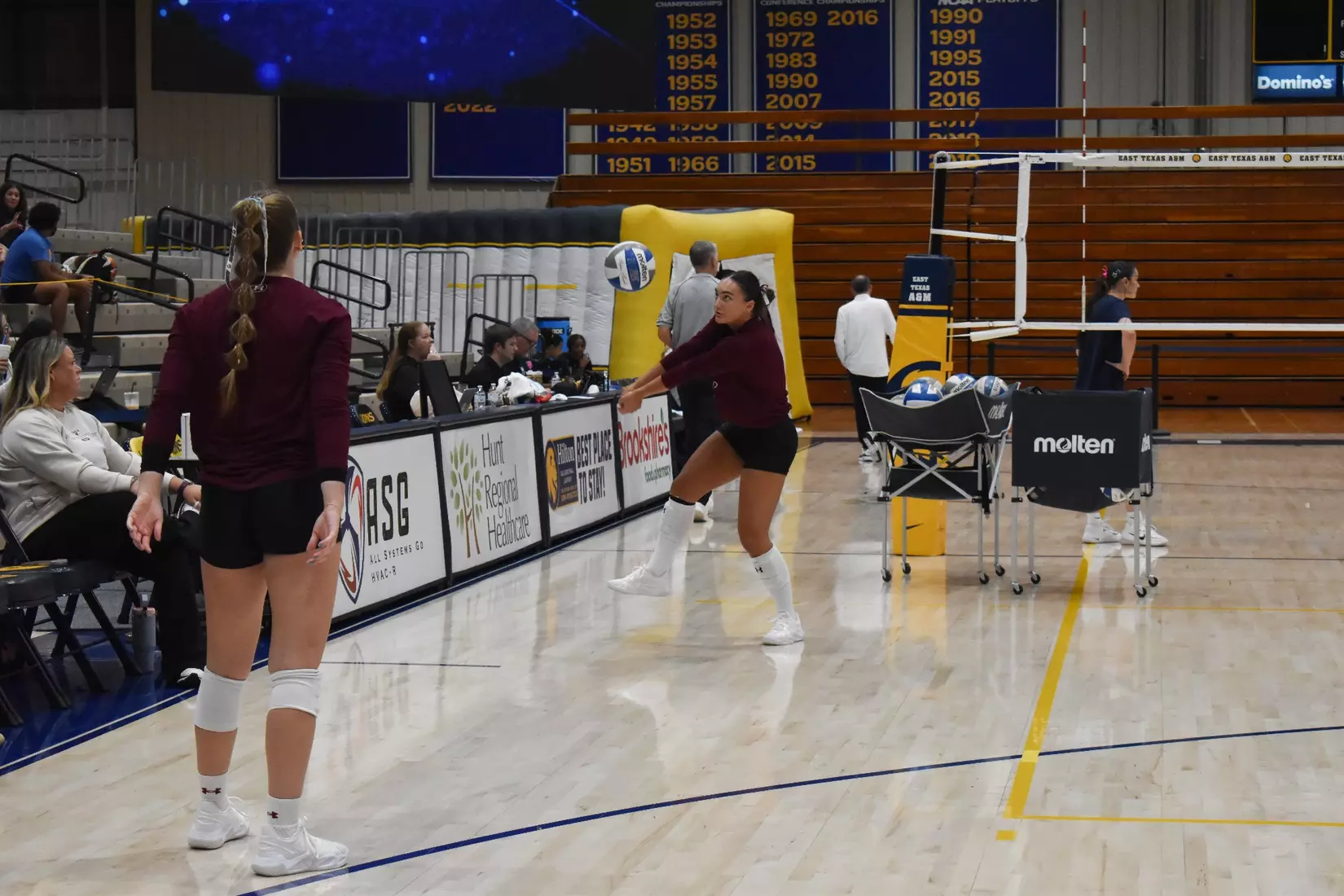 Jillian Shaneyfelt bumps a ball in warmups.