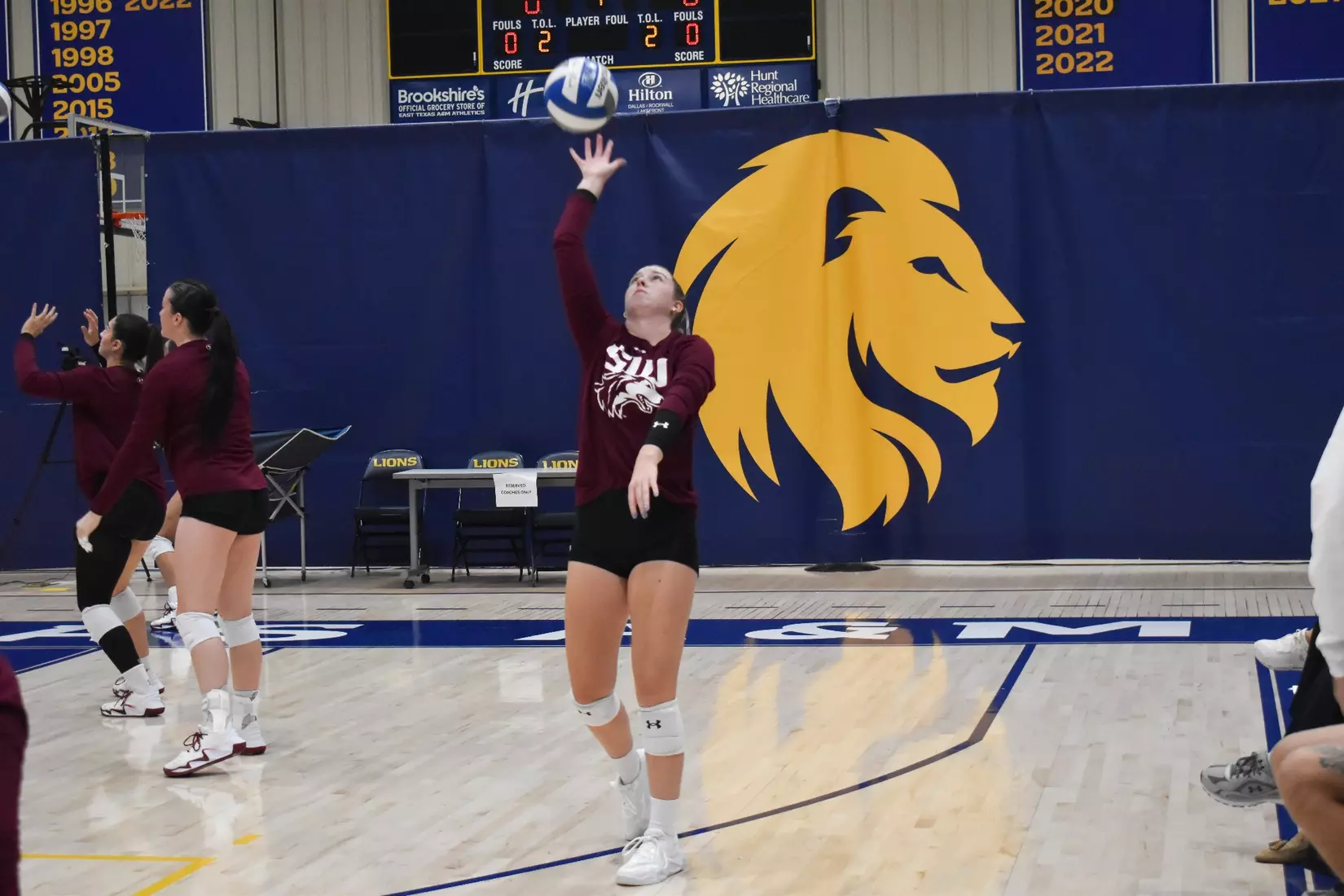 Julia Laidig spikes a ball in warmups.