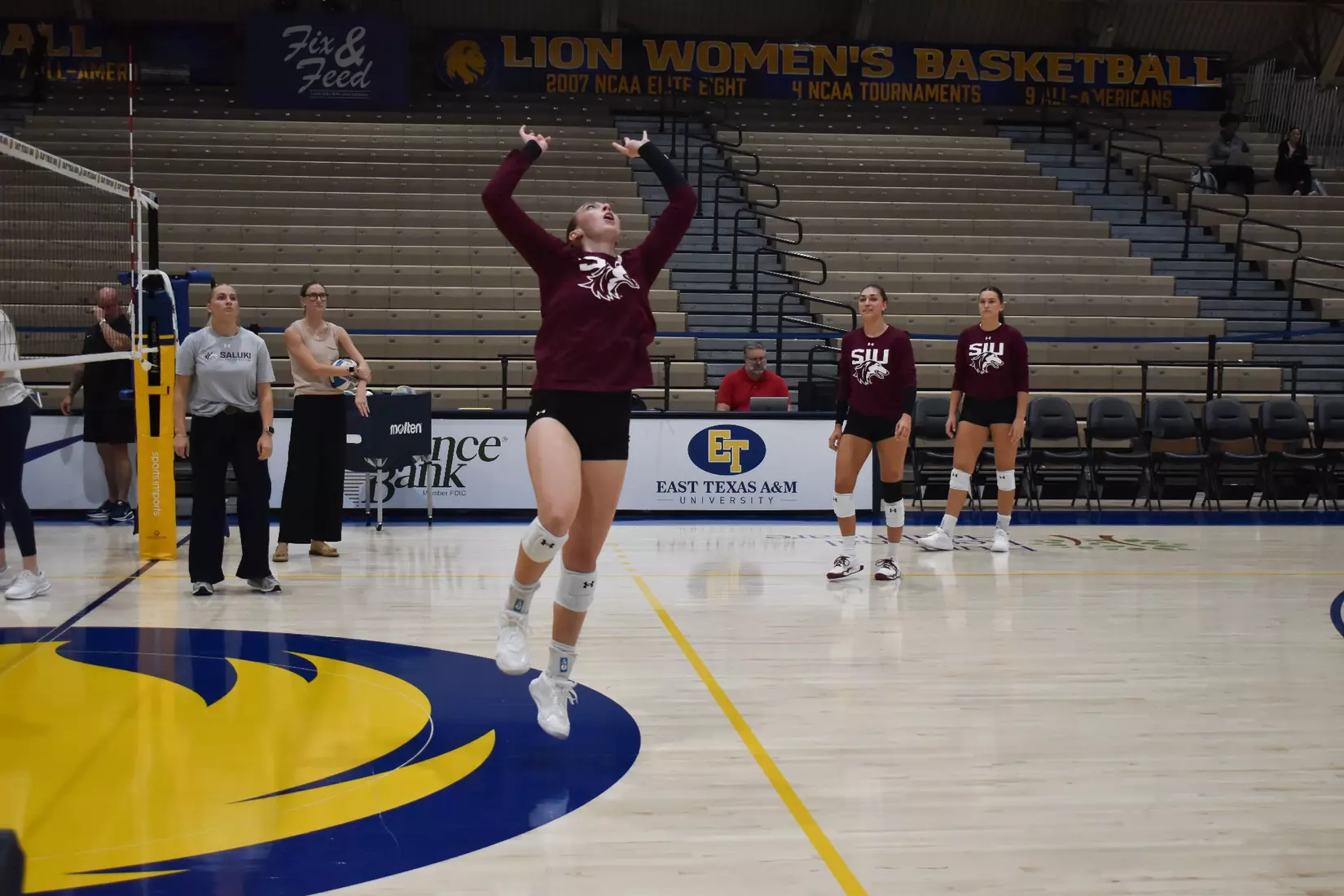 Natalie Vance sets a ball in warmups.