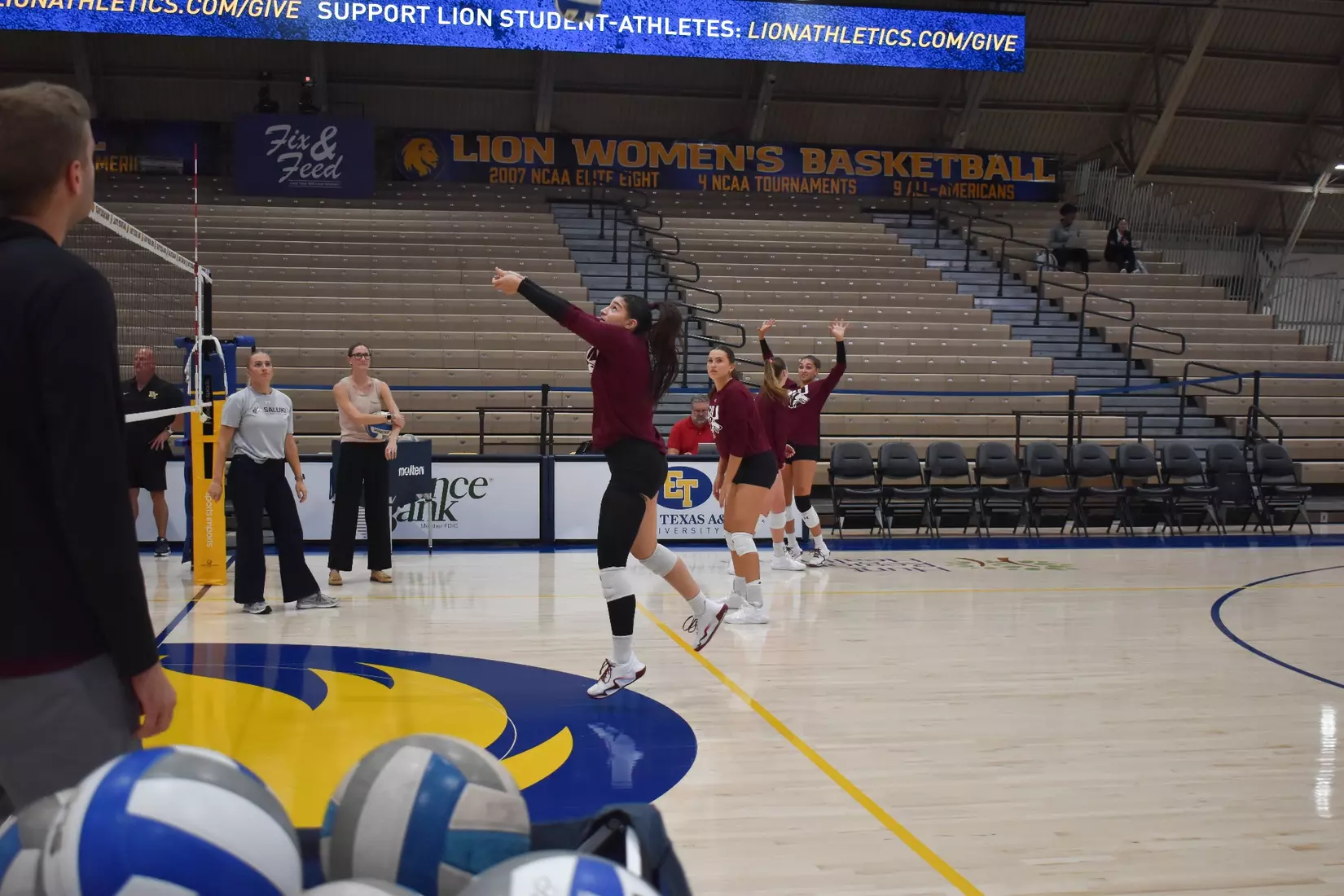 Una Stepic bumps a ball in warmups.