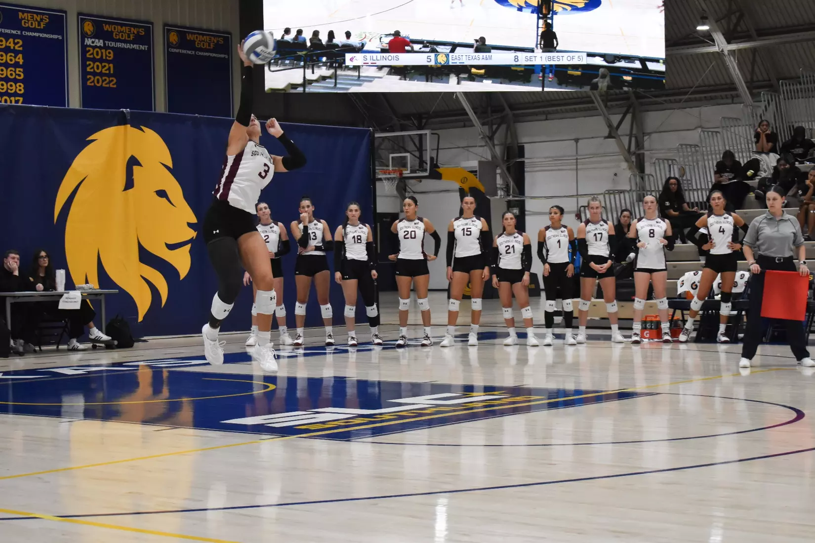 McKenzie Moeller serves a ball in the match.