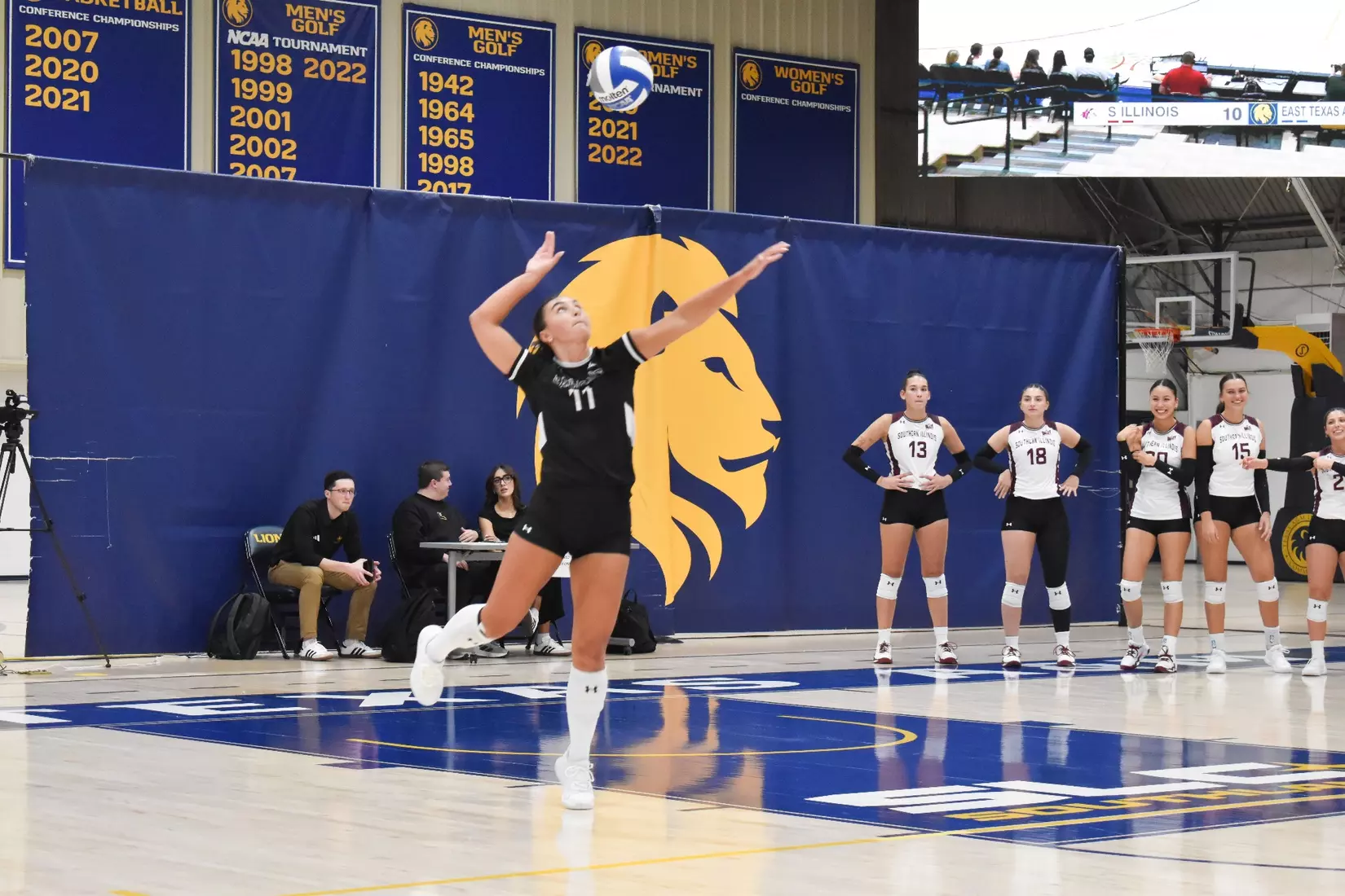 Jillian Shaneyfelt jumps up for a serve.