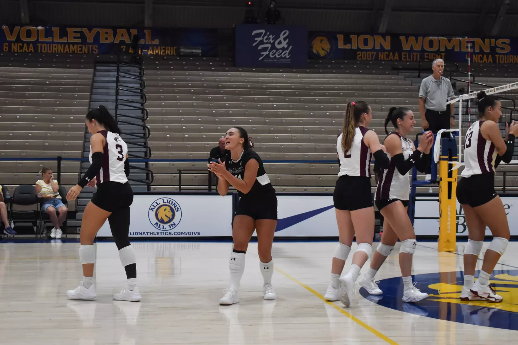 Jillian Shaneyfelt claps in celebration.