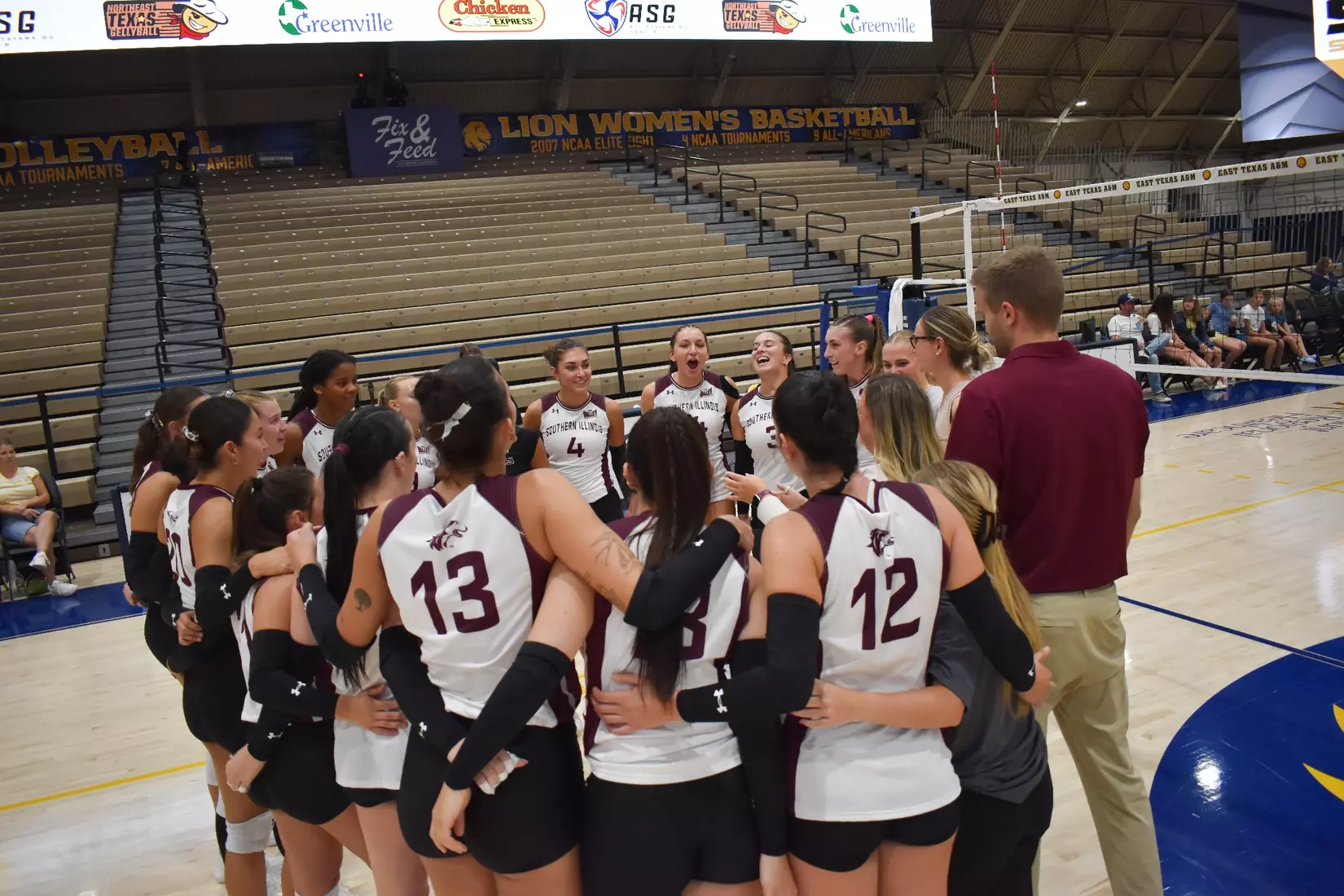 The team does a "Dawg Check" after their victory.