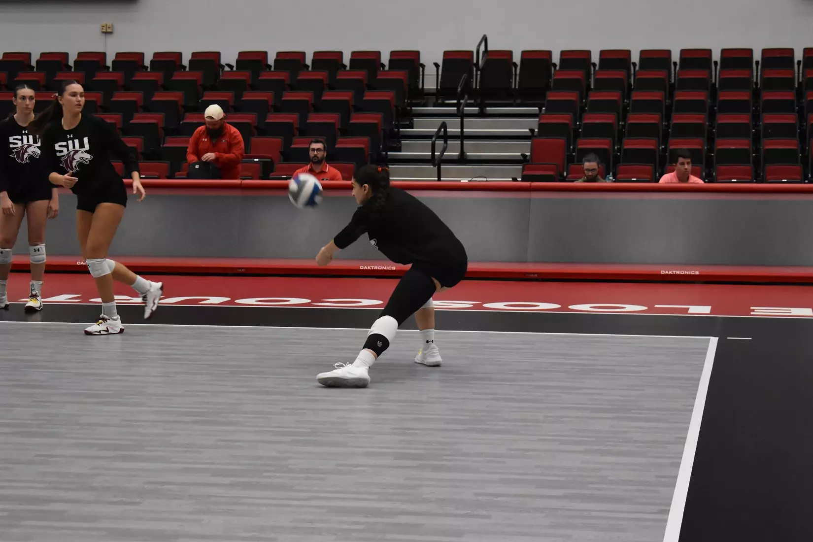 Una Stepic lunges and bumps a ball in warmups.
