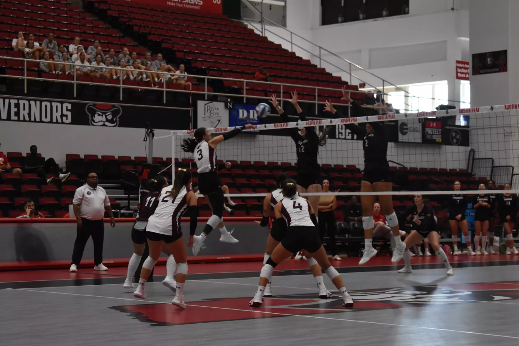 McKenzie Moeller attacks a ball.