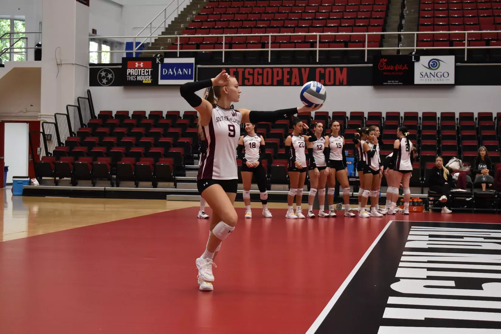 Lillian Dempkey prepares for her serve.