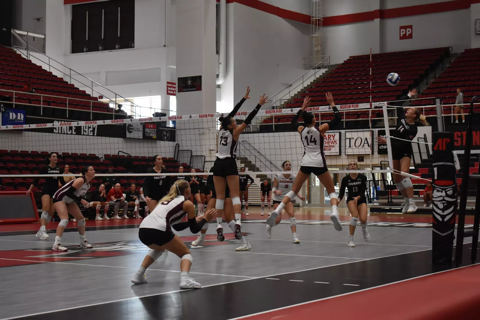 Beatriz Piaia and Ella Swansiger go up for a block.