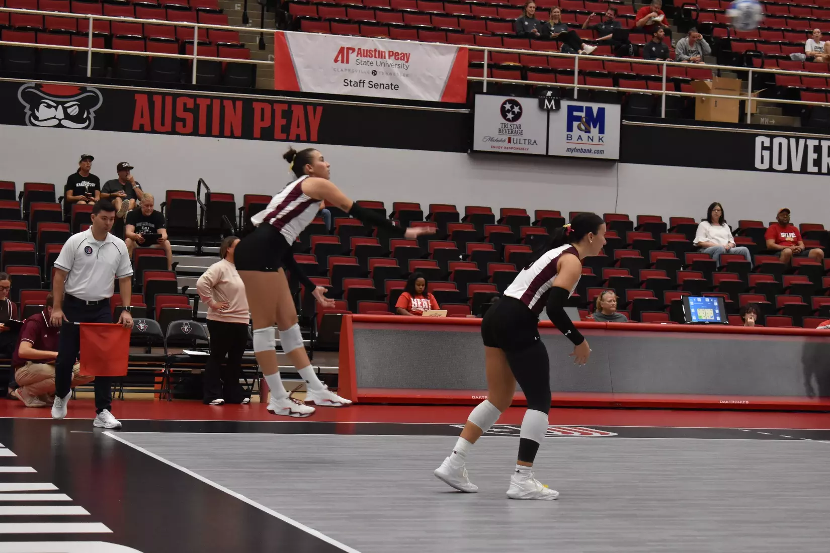 Beatriz Piaia follows through on her serve.