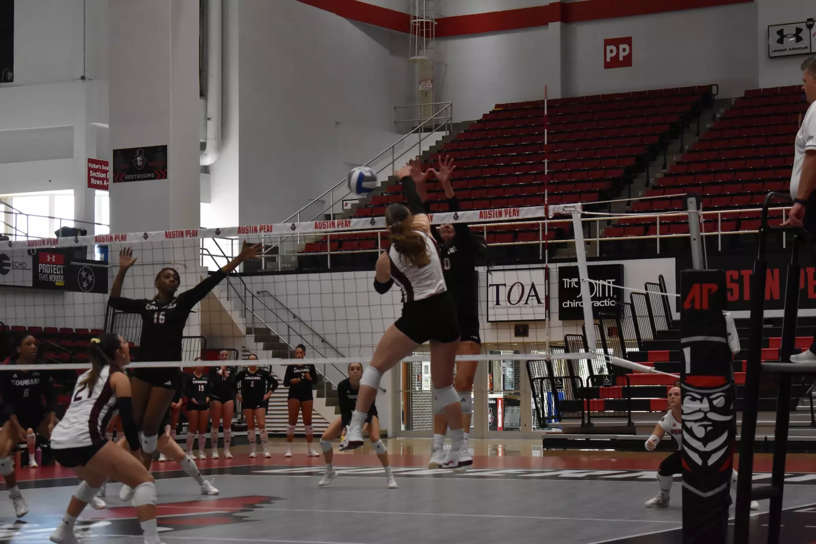 Natalie Vance attacks a ball.