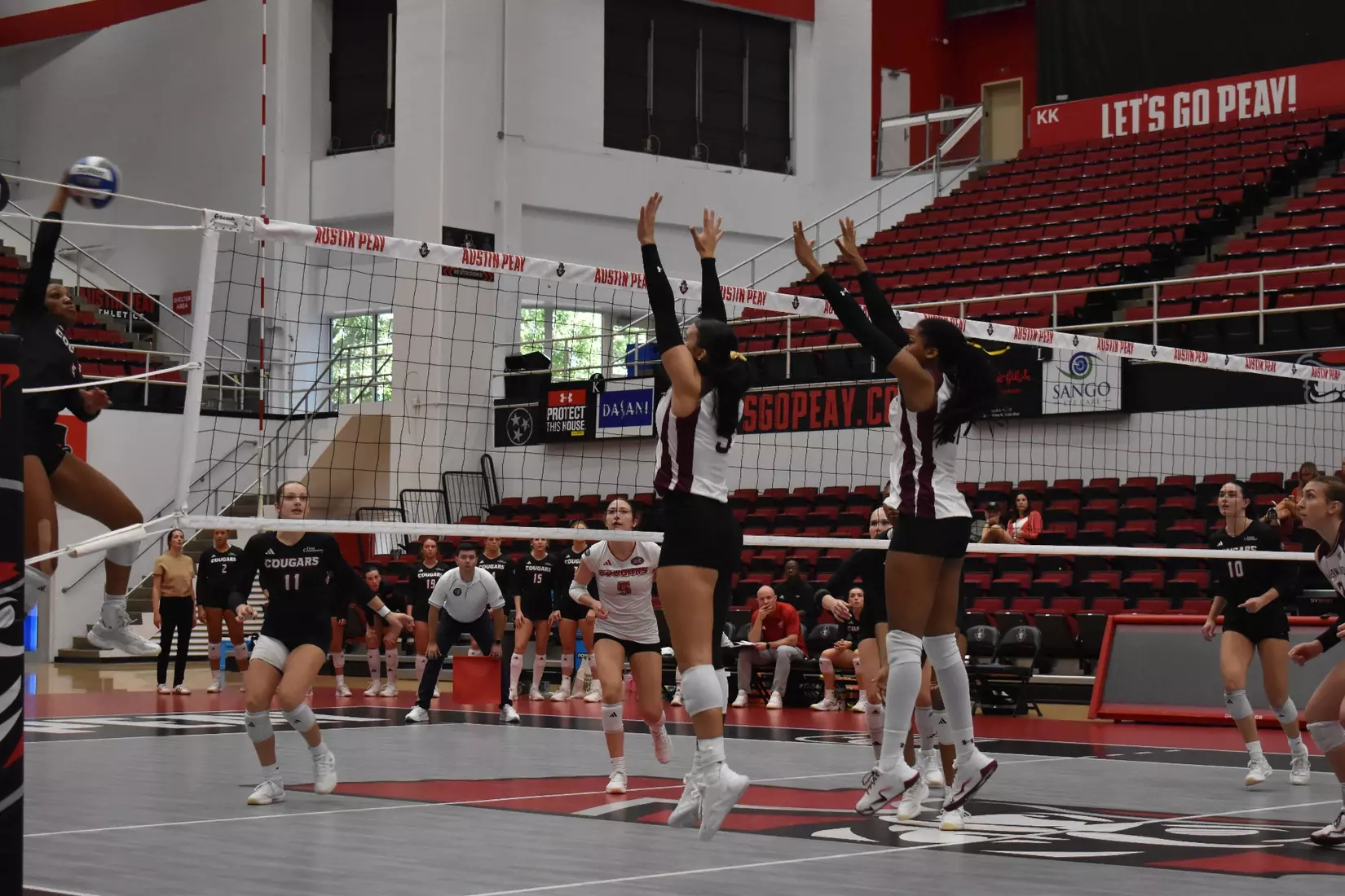 McKenzie Moeller and Chloe Anderson go up for a block.