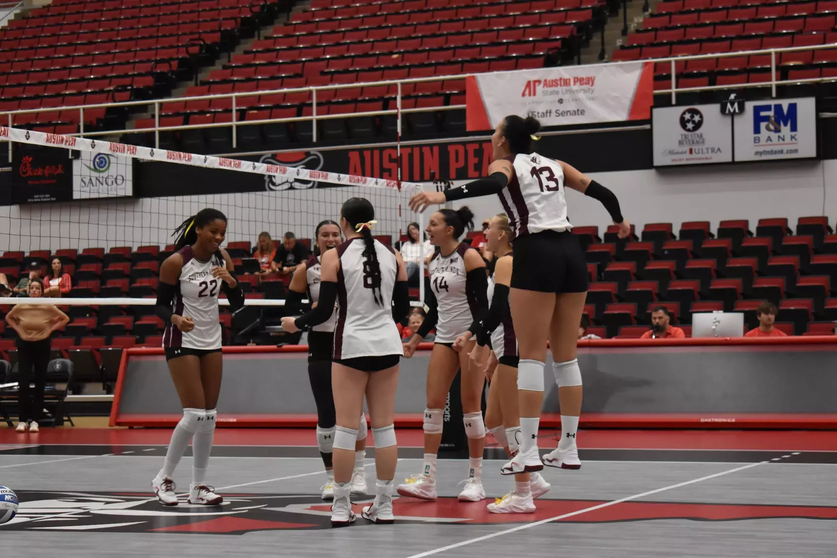 The team celebrates after a point.