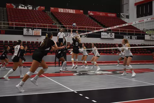 Lillian Dempkey sets a ball in the match.