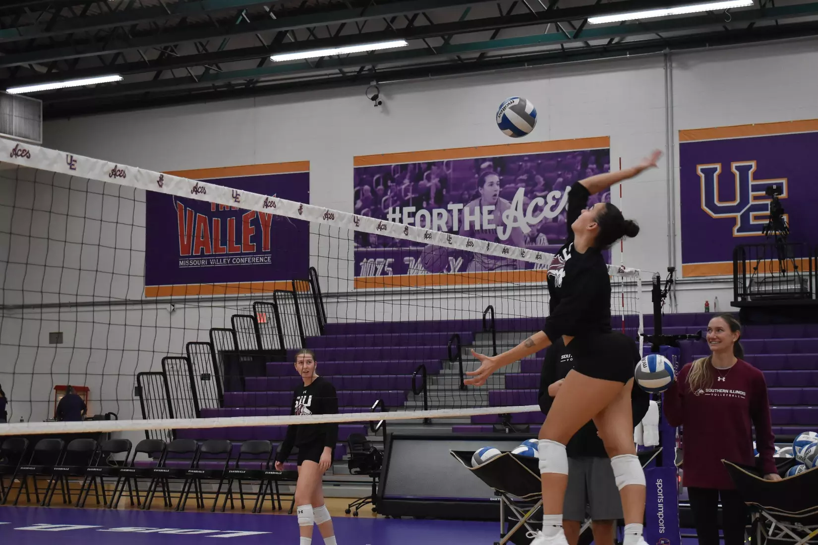 Beatriz Piaia attacks a ball in warmups.