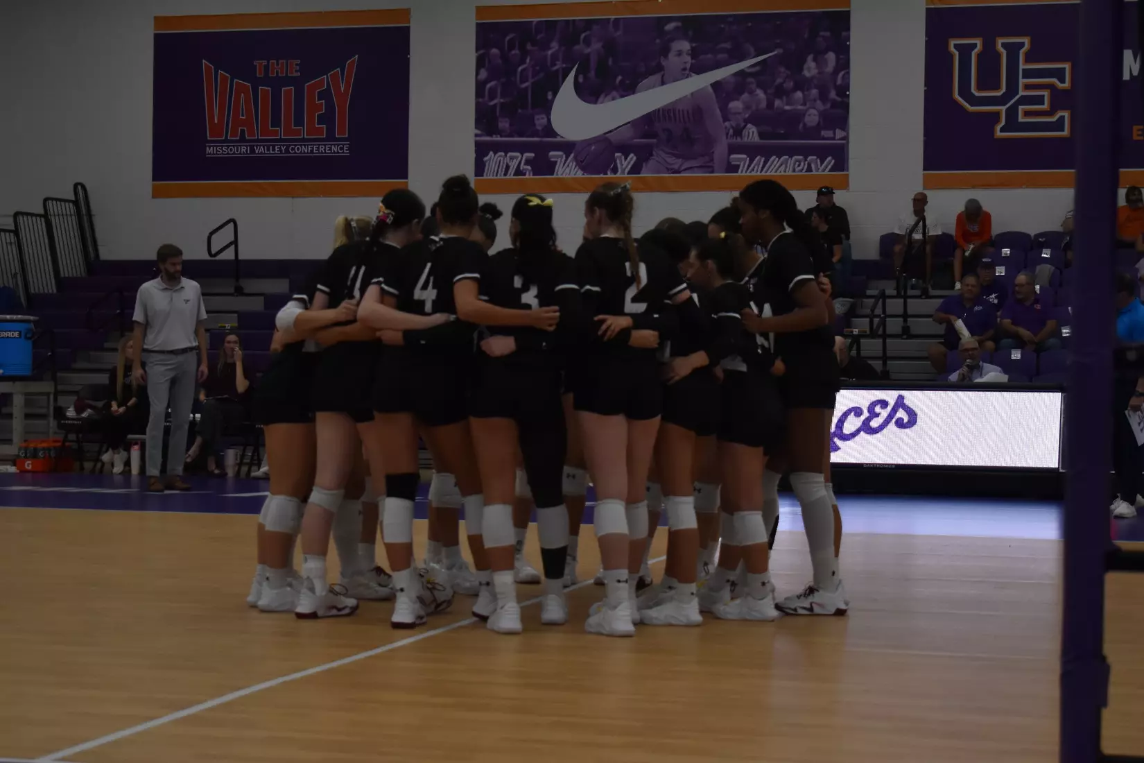 The team huddles one last time prior to the match.