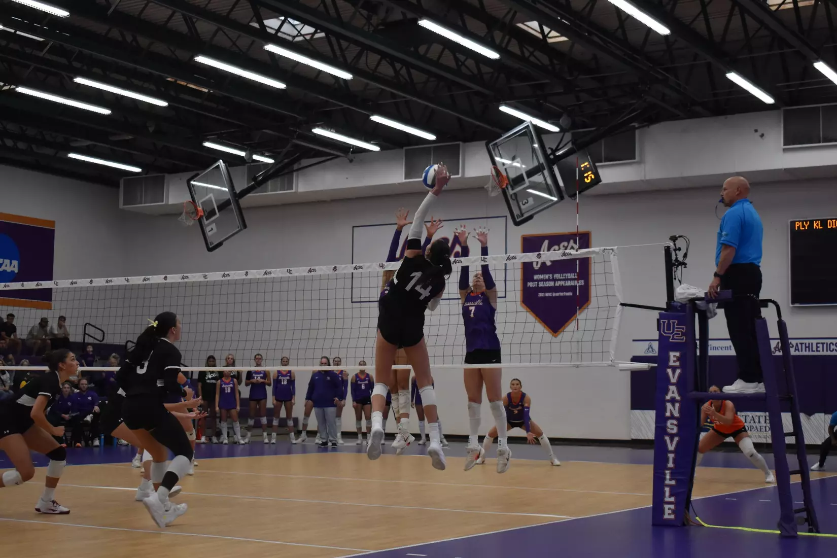 Ella Swansiger attacks a ball in the match.