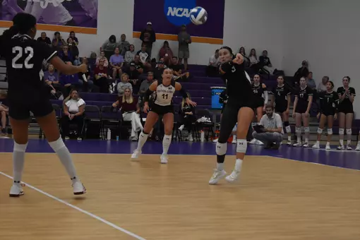 McKenzie Moeller receives a serve.