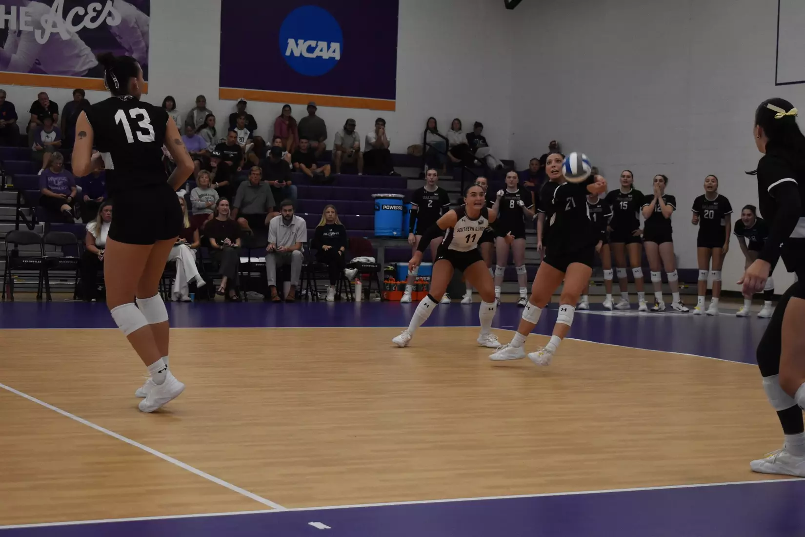 Isabella Del Real receives a serve.