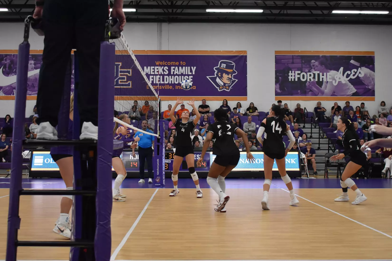 Ella McFarland sets a ball in the match.