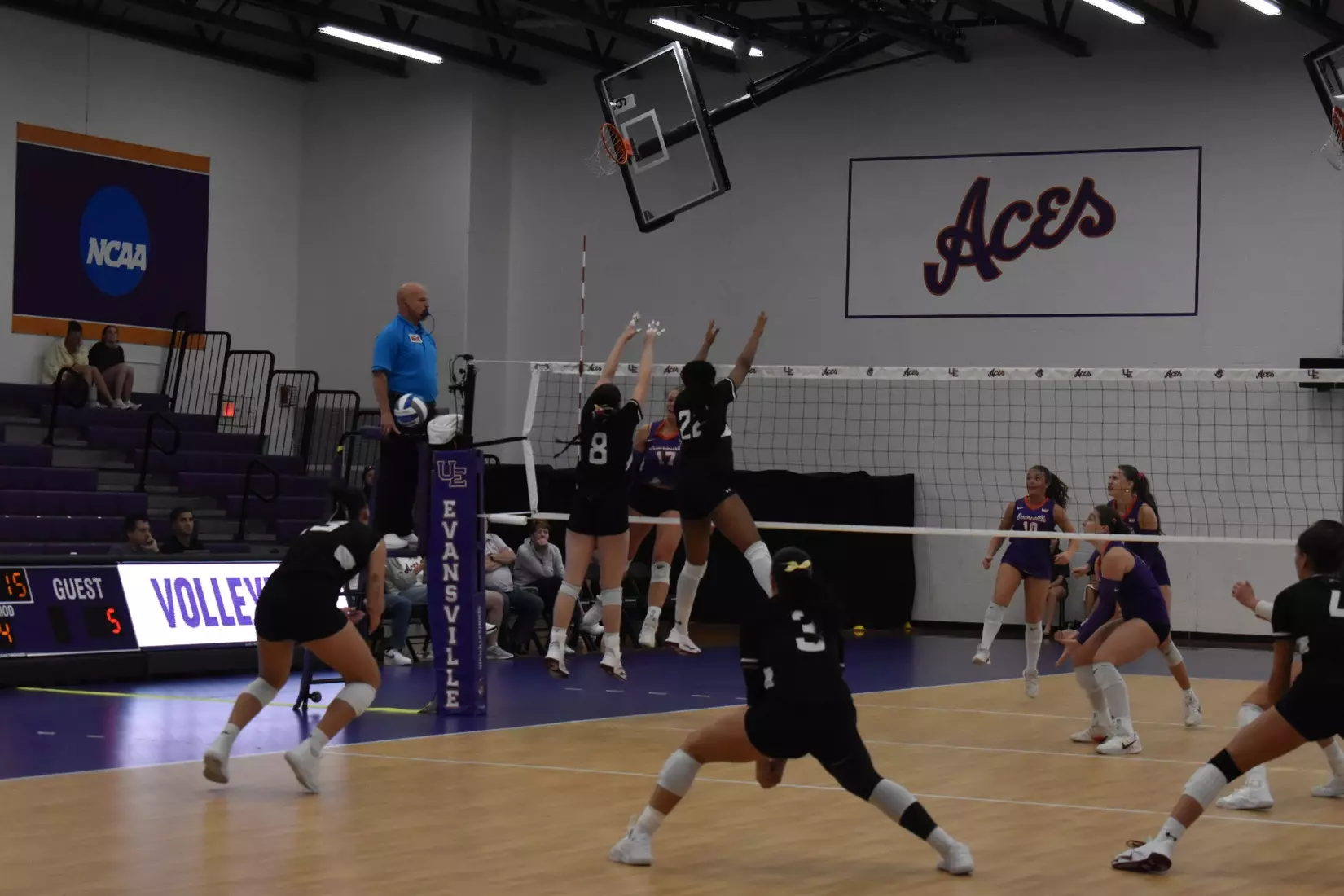 Alexandria Arrington and Chloe Anderson go up for a block.