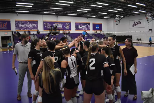 The team breaks down a huddle during a timeout.