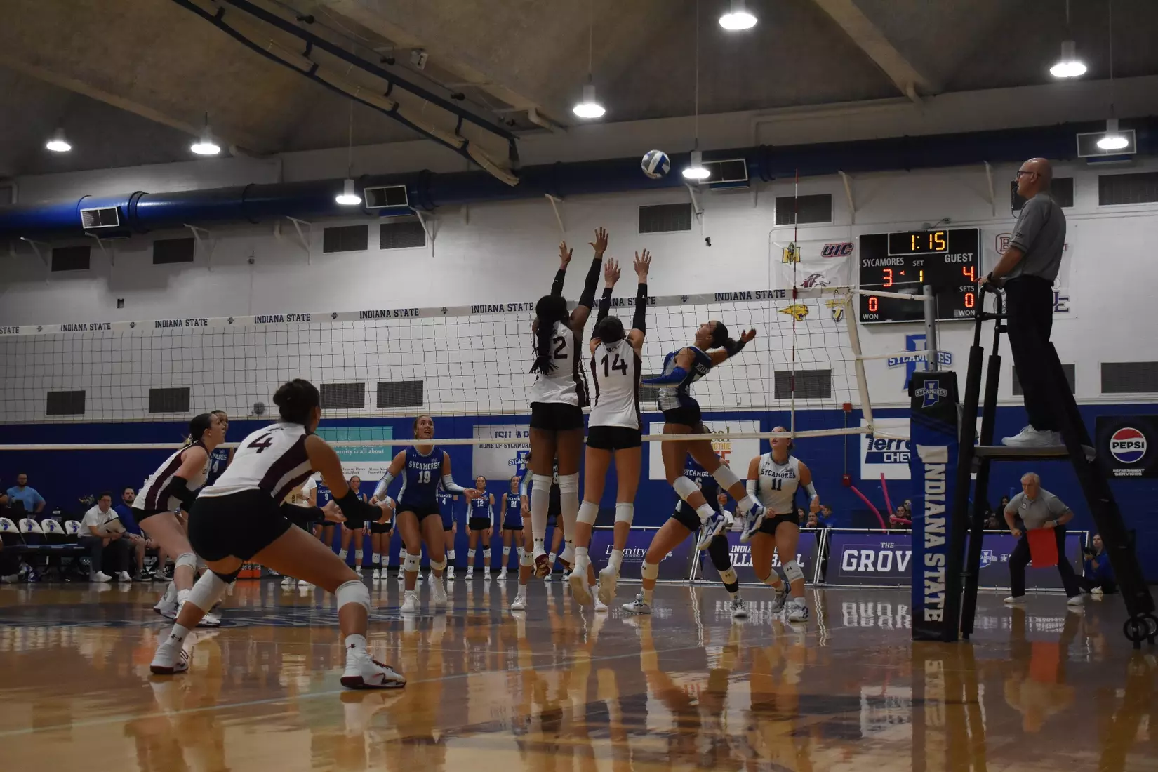 Ella Swansiger and Chloe Anderson go up for a block.