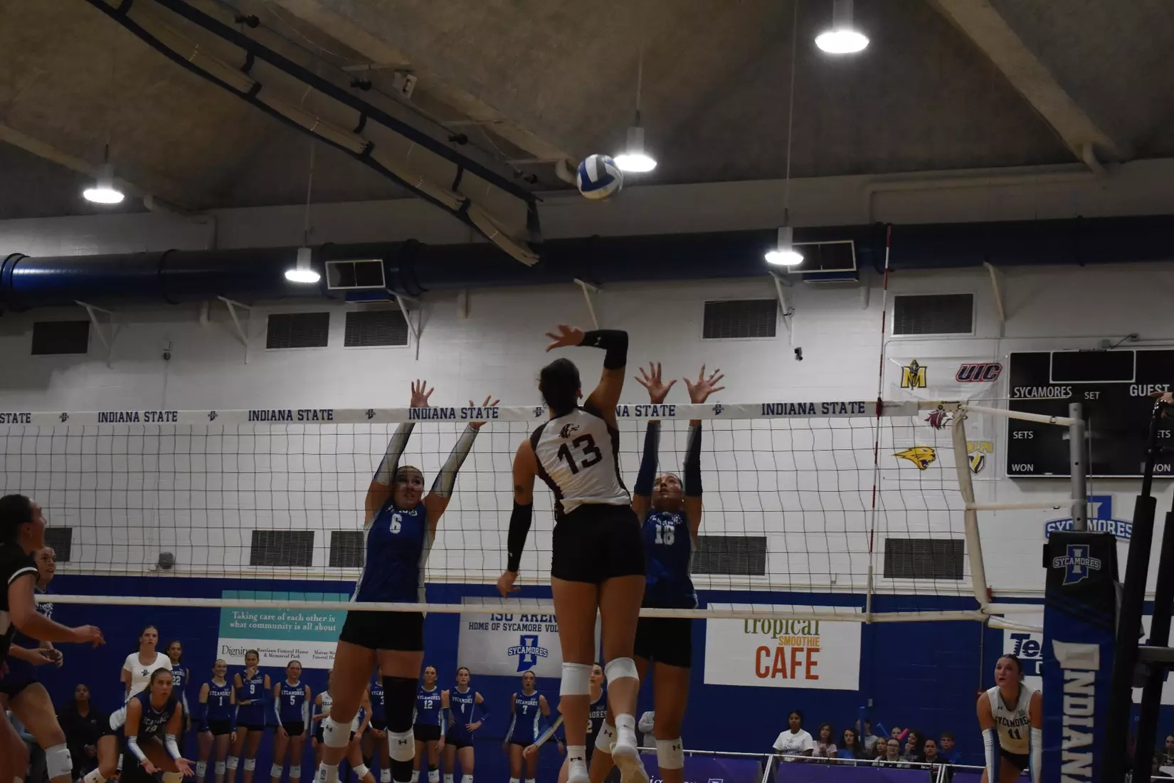 Beatriz Piaia swings her arm back as she attacks a ball.