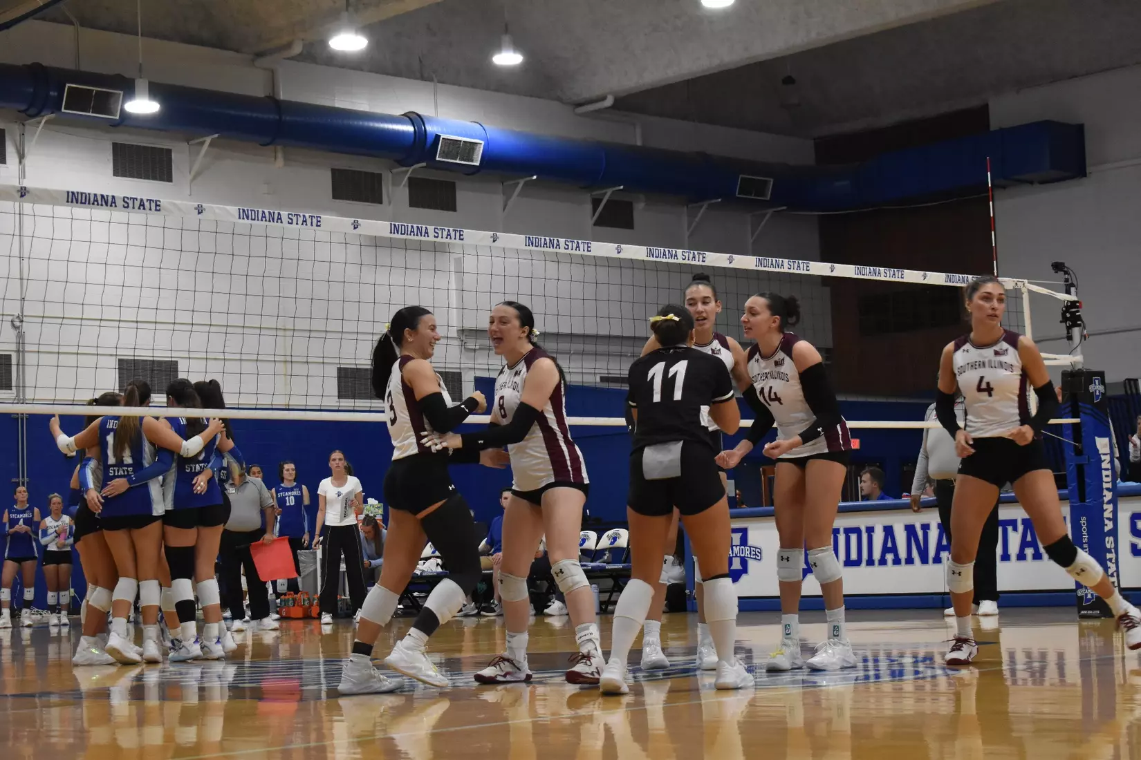 The team celebrates after a point.