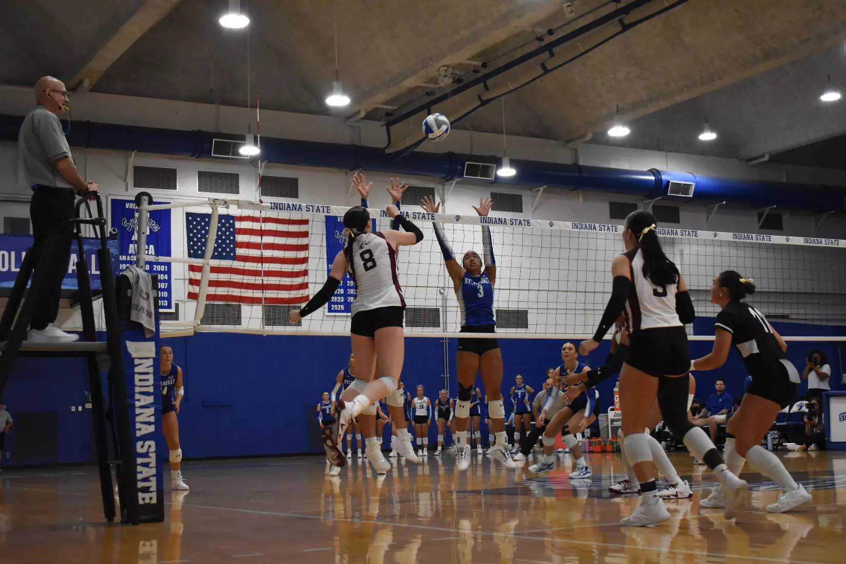 Alexandria Arrington attacks a ball.