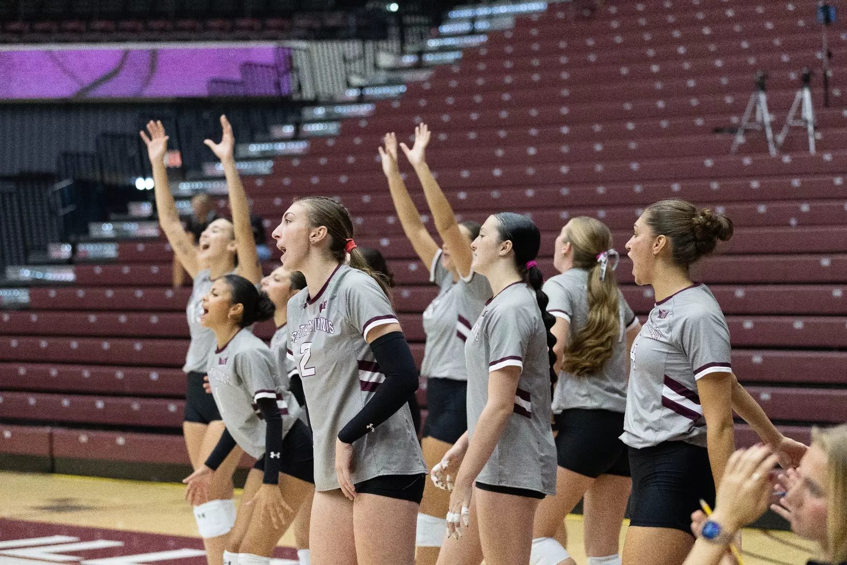The bench celebrates after a point.