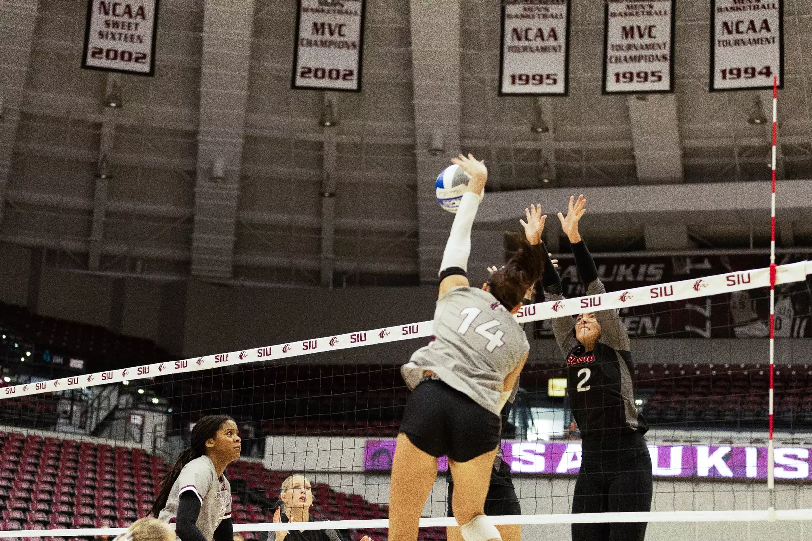 Ella Swansiger swings and attacks a ball.